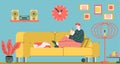 Man relaxing on home sofa with cup of tea and sleeping dog - cozy living room interior Royalty Free Stock Photo