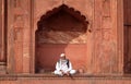 Man relaxing at Jama Masjid Mosque, Delhi Royalty Free Stock Photo