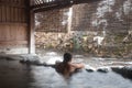 Man relaxing in Japanese onsen