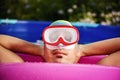 Man relaxing in a portable swimming pool Royalty Free Stock Photo