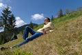 Man relaxing on a steep slope