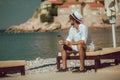 Man relaxing and use digital tablet at sea beach Royalty Free Stock Photo