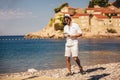 Man relaxing and use tablet computer at the beach Royalty Free Stock Photo