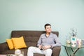 Man relaxing in a waiting room Royalty Free Stock Photo