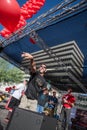 Man releases red baloon for AIDSwalk Royalty Free Stock Photo