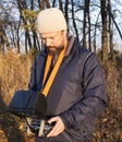 Man with Remote Control a dron in the park