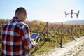 Man remote control flying drone Royalty Free Stock Photo