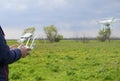 A man with a remote control in his hands. Flight control of the drone. Phantom Royalty Free Stock Photo