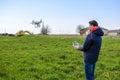 A man with a remote control in his hands. Flight control of the drone. Phantom Royalty Free Stock Photo