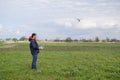 A man with a remote control in his hands. Flight control of the drone. Phantom Royalty Free Stock Photo