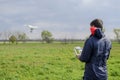 A man with a remote control in his hands. Flight control of the drone. Phantom