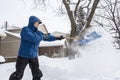 Man Removing Snow with a Shovel #5