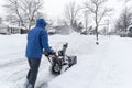 Man Removing Snow with a Snow Blower #3 Royalty Free Stock Photo