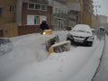 Man Removing Snow with a Snowblower