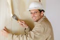 man removing wallpaper Royalty Free Stock Photo