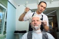Man repaint the hair in a beauty salon Royalty Free Stock Photo