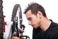 Man repairing bicycle