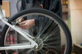 Man repairing a bike Royalty Free Stock Photo