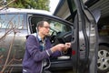 Man Repairing the Broken Car Door