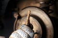 Man repairing a car disc brakes Royalty Free Stock Photo