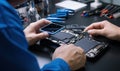 Man Repairing Cell Phone With Screwdriver Royalty Free Stock Photo