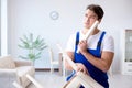 The man repairing chair in the room Royalty Free Stock Photo