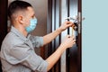 a man repairing a doorknob Royalty Free Stock Photo