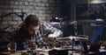Man repairing a drone in a garage Royalty Free Stock Photo