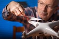 Man repairing drone Royalty Free Stock Photo