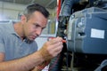 man repairing machine Royalty Free Stock Photo