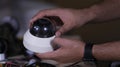 A man repairing secur camera in service center Royalty Free Stock Photo