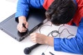 The man repairman repairing dvd player at service center