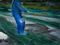 Man reparing fishnet