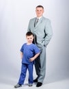 Man respectable businessman and little kid doctor uniform. Doctor respectable career. Dad boss. Father and cute small