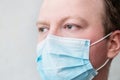 Man in respiratory mask, closeup portrait. Doctors face close up. Influenza, quarantine, coronavirus concept