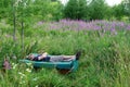 Homeless sleep in nature filed meadow Royalty Free Stock Photo