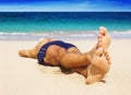 Man resting on the beach. Royalty Free Stock Photo