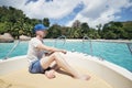 Man resting on boat Royalty Free Stock Photo