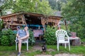 Man resting on a chair in his yard