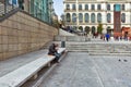 Man resting in front of the Reina Sofia Museum in Madrid Royalty Free Stock Photo