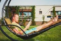 Man resting in the garden of the house Royalty Free Stock Photo