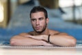 Man Resting His Arms At Edge Of Pool Royalty Free Stock Photo