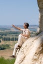 Man resting on the mountain rock Royalty Free Stock Photo