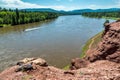 Man resting on rock above the river Irkut