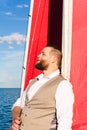 Man resting on a sailing boat Royalty Free Stock Photo