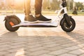 Man Ride On Electric Scooter Mobility. E-Scooter Rider Rent Personal Eco Transport. Driving Ecology Transportation. Male Royalty Free Stock Photo