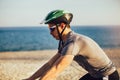 Man ride mountain bike on the beach. Royalty Free Stock Photo