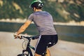 Man ride mountain bike on the beach Royalty Free Stock Photo