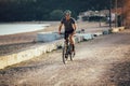 Man ride mountain bike on the beach. Royalty Free Stock Photo