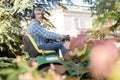 Man on ride on mower Royalty Free Stock Photo